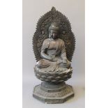 A large bronze model of Buddha seated. 65.5 cm high.