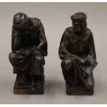 A pair of patinated bronze models of scholars. Each 12.5 cm high.