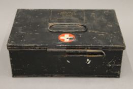 A vintage Regalo First Aid tin. 23.5 cm wide.