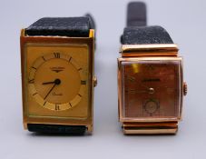 Two Longines wristwatches.