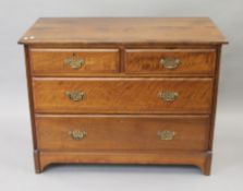 A Victorian walnut chest of drawers. 106 cm wide.