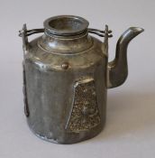 A Chinese pewter teapot. 13 cm high.