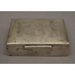 An Egyptian silver cigarette box. 11 cm wide. (152.