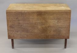 A 19th century mahogany drop leaf table.