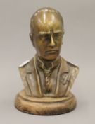 A bronze bust on a gentleman. 20 cm high.