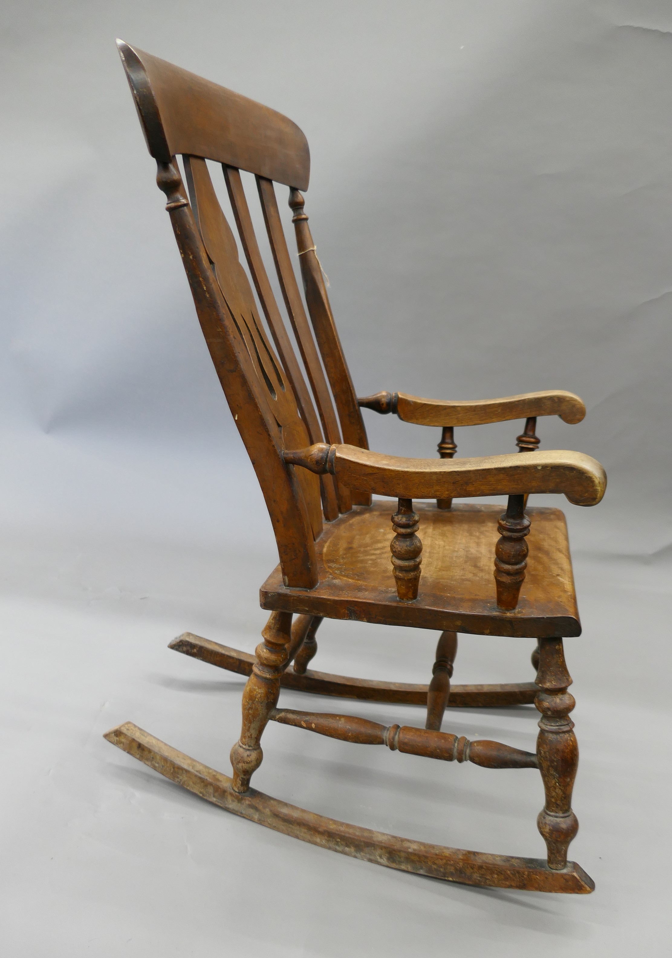 A Victorian splat back rocking chair. 53.5 cm wide. - Image 4 of 5