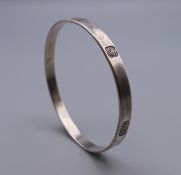 A silver hallmarked bangle. 20.6 grammes.