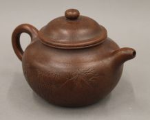 A Yixing teapot. 20 cm wide.