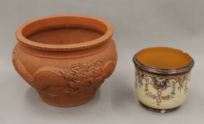 A large Japanese jardiniere and a Royal Doulton jardiniere. The former 24 cm high.