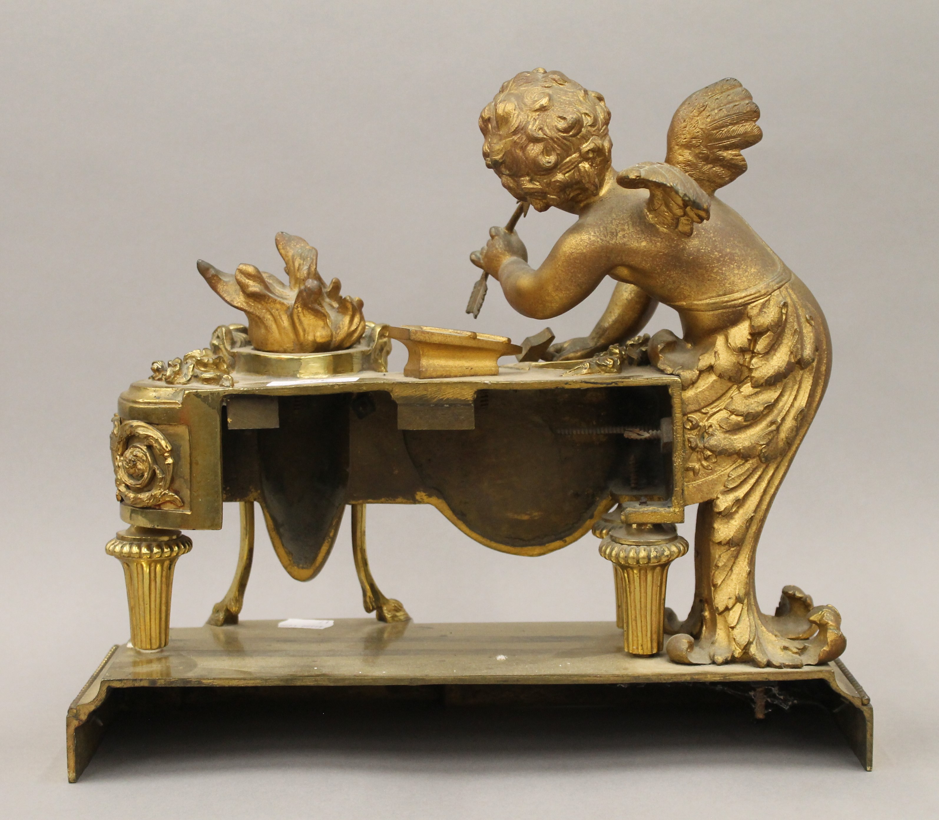 A bronze model of a cherub. 33.5 cm wide. - Bild 3 aus 3