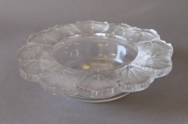 A Lalique glass leaf pattern dish, signed Lalique R France. 21.5 cm diameter.