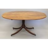 A 19th century mahogany breakfast tilt top table. 155 cm long.