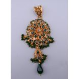 An Indian wedding pendant.