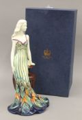 An Old Tupton ware porcelain figurine, boxed. 35.5 cm high.