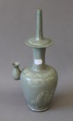 A Korean celadon wine ewer. 32 cm high.