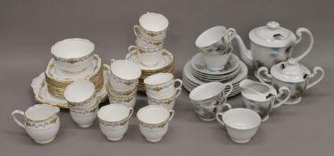 A Japanese eggshell tea set and a Royal Albert tea set