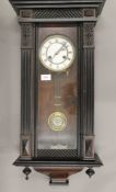 A 19th century Vienna wall clock. 74 cm high.