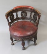 A 19th century leather upholstered carved oak Burgomeister chair. 71 cm wide.