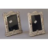 A pair of Art Nouveau style silver photograph frames. 16 x 20 cm.