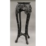 A late 19th century Chinese marble inset urn stand. 91 cm high.