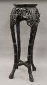 A late 19th century Chinese marble inset urn stand. 91 cm high.