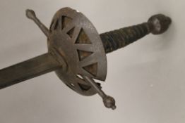 An antique cup handled sword. 100 cm long.