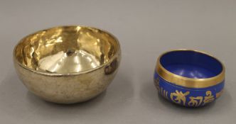 Two singing bowls. The largest 13 cm diameter.