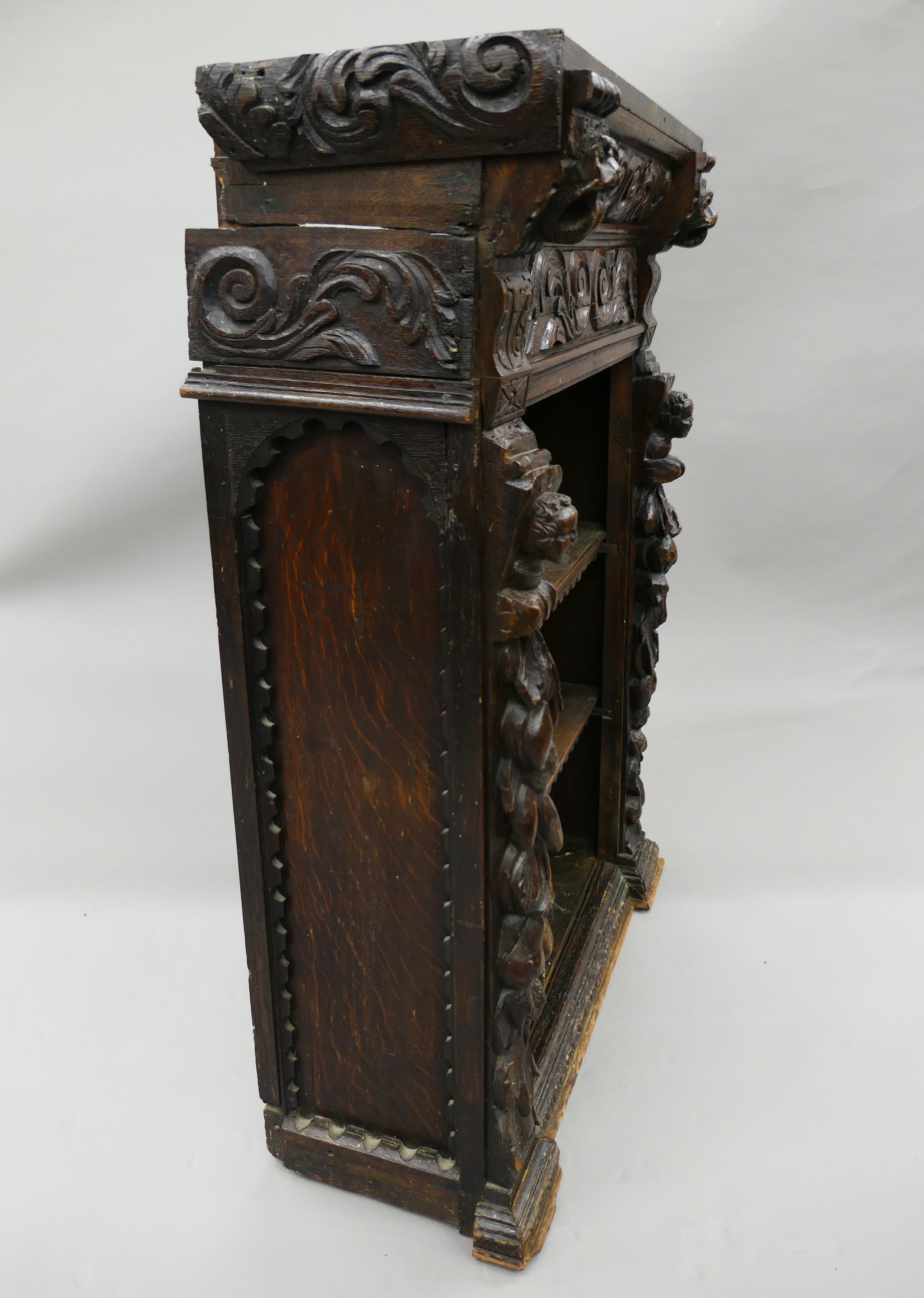 A 19th century oak bookcase carved with figures and foliage. 69.5 cm wide. - Image 10 of 13