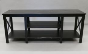 A modern console table by Oka. 155 cm wide.