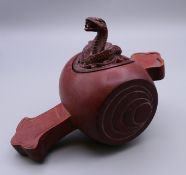 A Japanese box, the lid carved as a snake. 8.5 cm high.