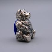 A silver teddy bear pin cushion. 3 cm high.