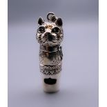 A silver cat whistle. 4 cm high.