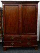 A 19th century mahogany two door wardrobe. 130 cm wide x 179 cm high.