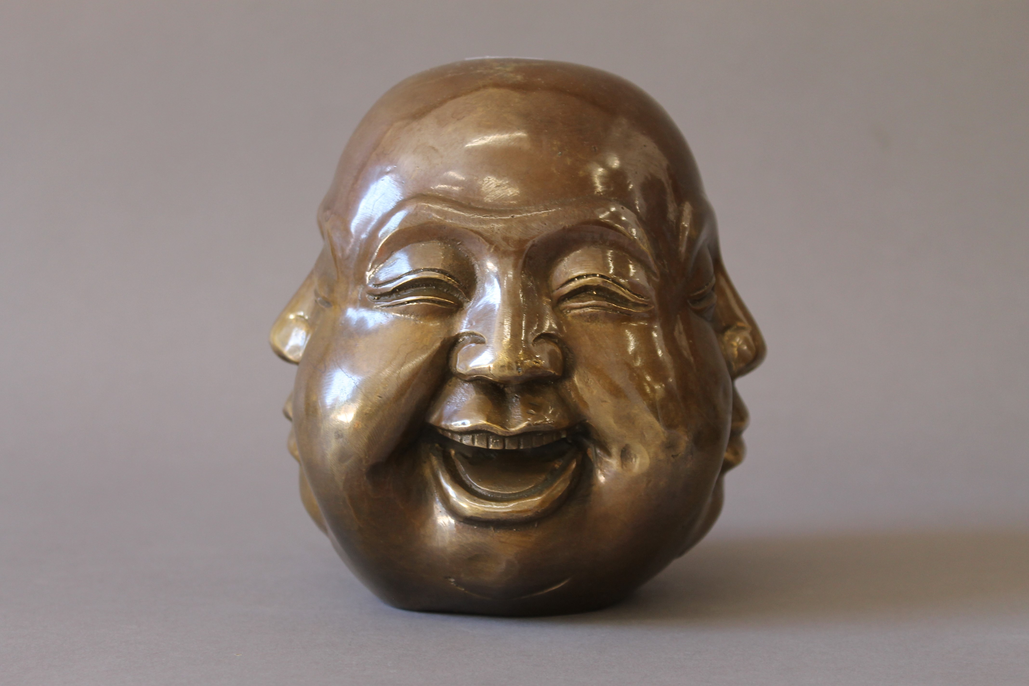 A bronze four faced Buddha. 13 cm high. - Bild 4 aus 6