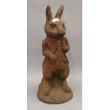 A cast iron model of Peter Rabbit. 49 cm high.