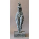 A patinated bronze abstract sculpture of a woman. 62 cm high.