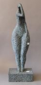 A patinated bronze abstract sculpture of a woman. 62 cm high.