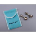 A pair of Tiffany silver cufflinks.