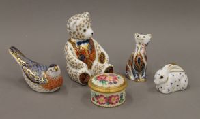 Four Royal Crown Derby paperweights and a Royal Worcester porcelain box