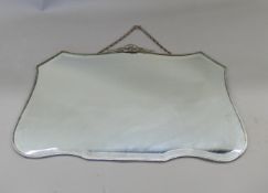 An Art Deco wall mirror. 70 cm wide.