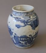 A Chinese blue and white porcelain bulbous vase. 20 cm high.