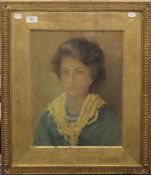 K M GOODWIN, Portrait of a Lady, pastel on paper laid on board, framed and glazed. 33 x 41 cm.