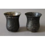 Two early Persian silver beakers. Each 9 cm high.