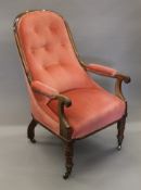 A 19th century upholstered mahogany open armchair. 60 cm wide.