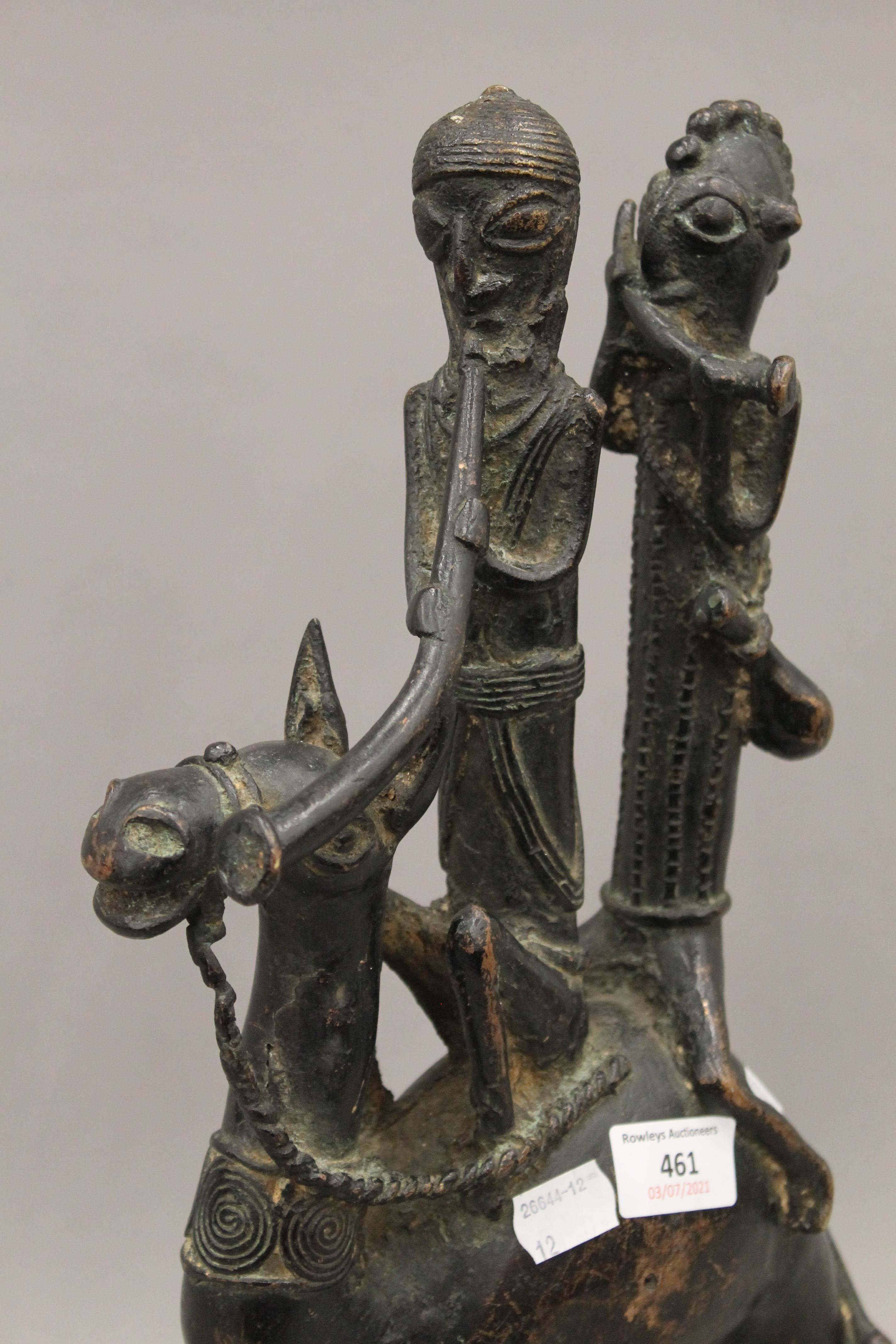 An African bronze group of two musicians riding a camel. 41.5 cm high. - Bild 2 aus 2