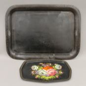 A 19th century toleware tray and a small tin tray. The former 71 cm wide.