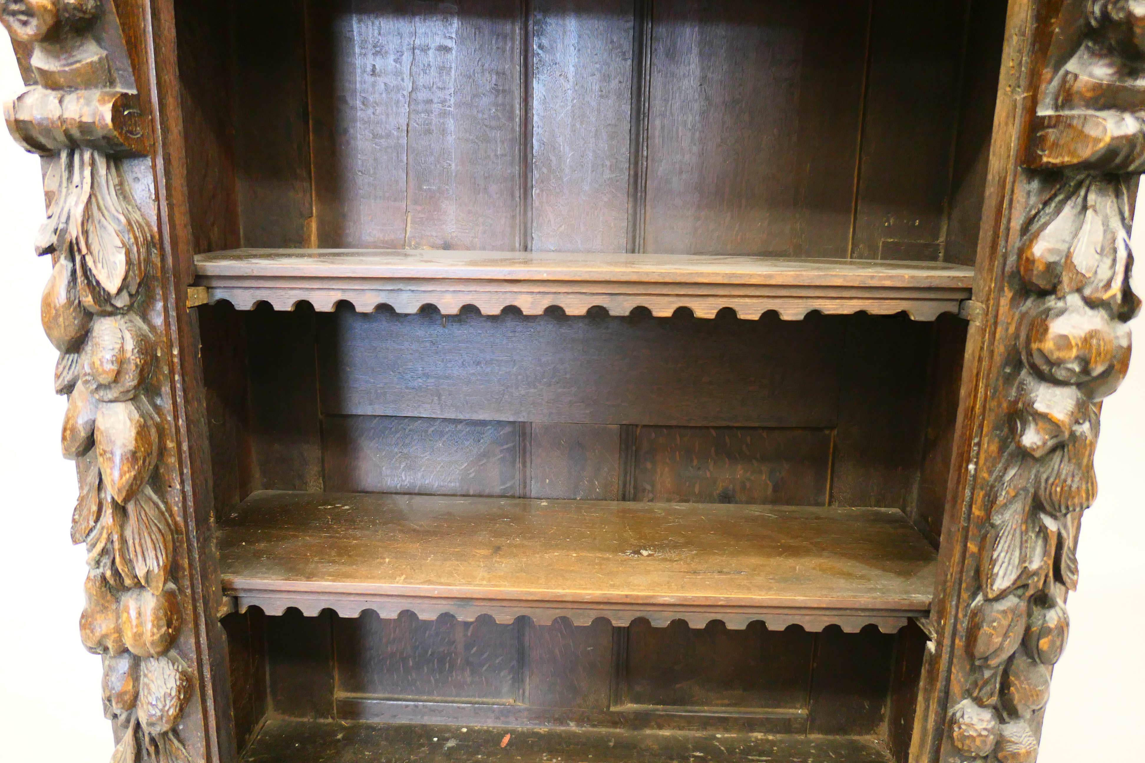 A 19th century oak bookcase carved with figures and foliage. 69.5 cm wide. - Image 8 of 13