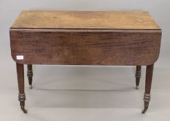 A 19th century mahogany Pembroke table. 112 cm long.