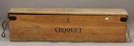 A boxed Jaques croquet set.