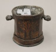 An 18th century painted lead tobacco pot. 11.5 cm high.